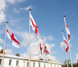 Flags of Saint George Waving Proudly on Community Square, Gravesend Flags of Saint George Waving Proudly on Community Square, Gravesend