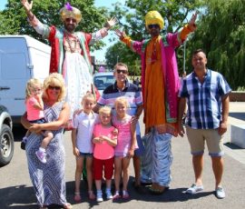 Nutkhut Stiltwalkers with members of the Crowd Nutkhut Stiltwalkers with members of the Crowd